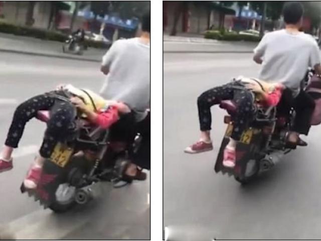 Phẫn nộ bố buộc con gái vào sau xe máy để chở tới trường