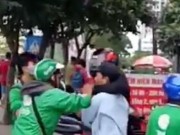 Tin tức trong ngày - Tài xế Grabbike bị hành khách cho “ăn mưa đòn” vì “tội” không vượt đèn đỏ