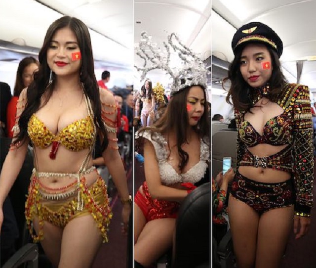 Báo nước ngoài đăng vụ bikini phản cảm trên máy bay đón U23 VN - 1
