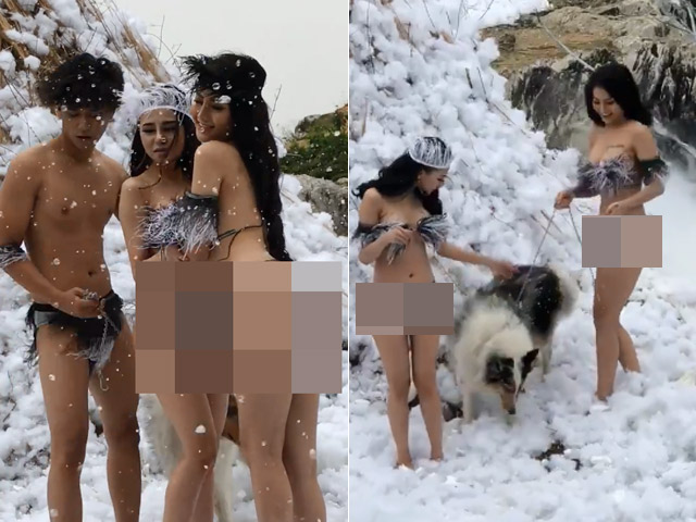 Hai cô gái mặc hở hang chụp ảnh dưới tuyết bị ”ném đá” dữ dội