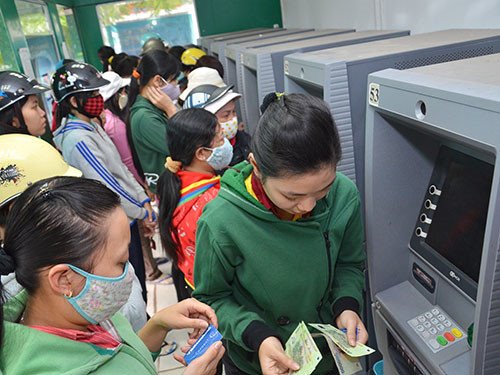 Những lưu ý sử dụng thẻ ATM an toàn trong dịp Tết - 1