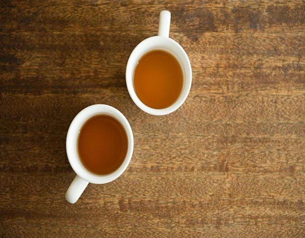 Uống trà, cà phê quá nóng tăng nguy cơ mắc ung thư - 1