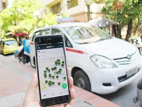 Grab, Uber đang rời xa mô hình kinh tế chia sẻ? - 1