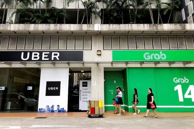 Lập hội đồng xử lý vụ GrabTaxi mua Uber Việt Nam - 1