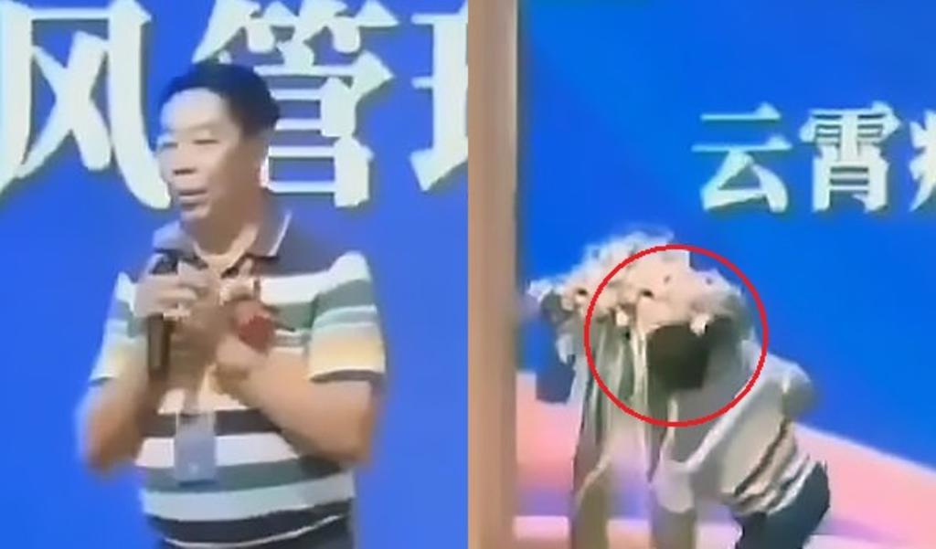 ông Chen Peiwen ngã gục khi đang phát biểu trên sân khấu