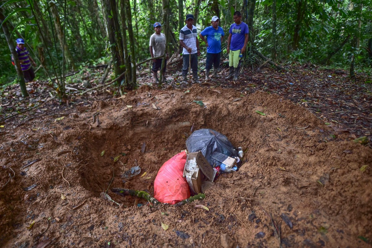 Hố chôn tập thể được phát hiện gần nhà thờ của tổ chức tà giáo (ảnh: SCMP)