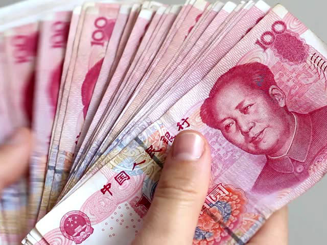 Ngân hàng Trung ương Trung Quốc sử dụng đến tia cực tím và lò sấy nhiệt độ cao để khử trùng tiền mặt. Ảnh Echeck