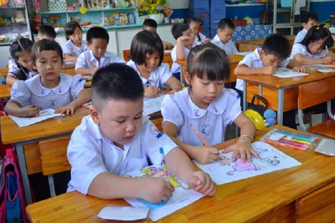Học sinh tại Hà Nội và TP. Hồ Chí Minh sẽ đi học trở lại từ thứ Hai (17/2). Ảnh minh họa NLĐ.
