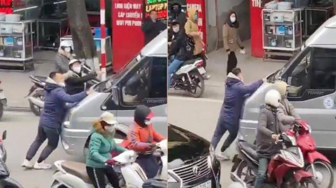 Hình ảnh lái xe ô tô 16 chỗ nhấn ga đẩy người trên đường Trần Đại Nghĩa - Lê Thanh Nghị, quận Hai Bà Trưng được người dân ghi lại