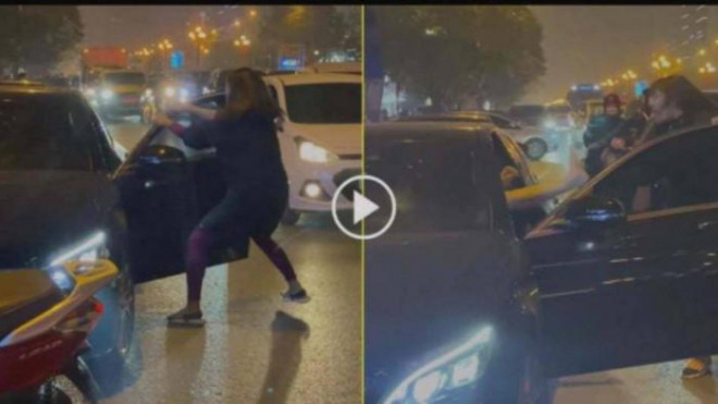 Hình người phụ nữ đi xe máy Honda Lead giật cửa xe ô tô Mercedes đánh ghen trên đường Lê Văn Lương gây xôn xao dư luận