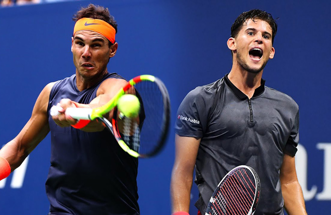 Nadal (trái) gặp chấn thương lưng, phong độ của anh tại Australian Open 2021 đang là dấu hỏi lớn
