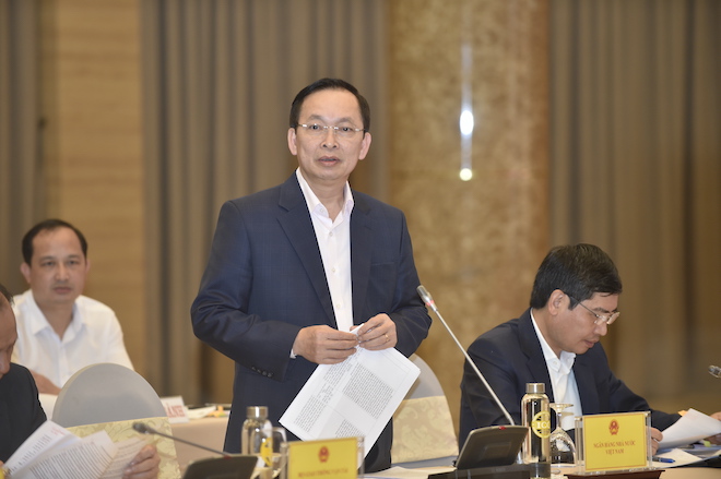 Phó Thống đốc NHNN Đào Minh Tú trả lời các câu hỏi của phóng viên. (Ảnh: VGP/Nhật Bắc)