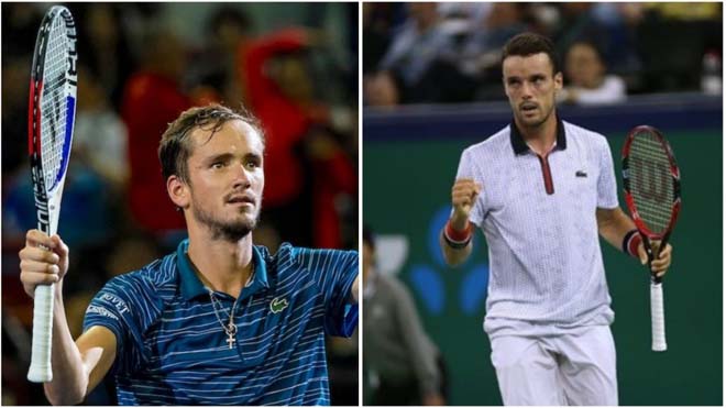 Medvedev (trái) đối diện với thử thách khó khăn mang tên Bautista Agut