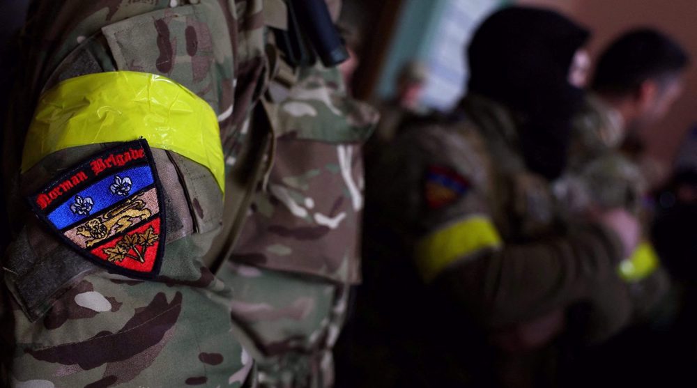 Một nhóm lính đánh thuê nước ngoài chuẩn bị ra tiền tuyến ở Ukraine.