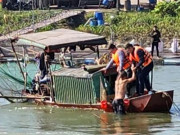 Pháp luật - Bị truy bắt, nghi phạm giết người cầm chai thuốc trừ sâu nhảy xuống sông