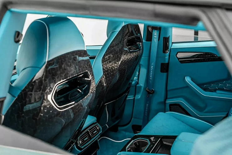 Lamborghini Urus được hãng độ Mansory "lột xác" thành xe hai cửa - 12