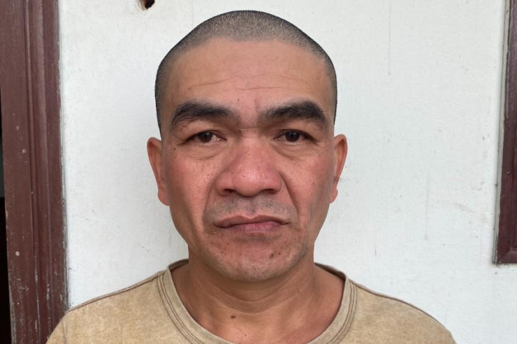 Bị can Lê Minh Quang bị bắt khi đang trốn lệnh truy nã về tội hiếp dâm. Ảnh: CA