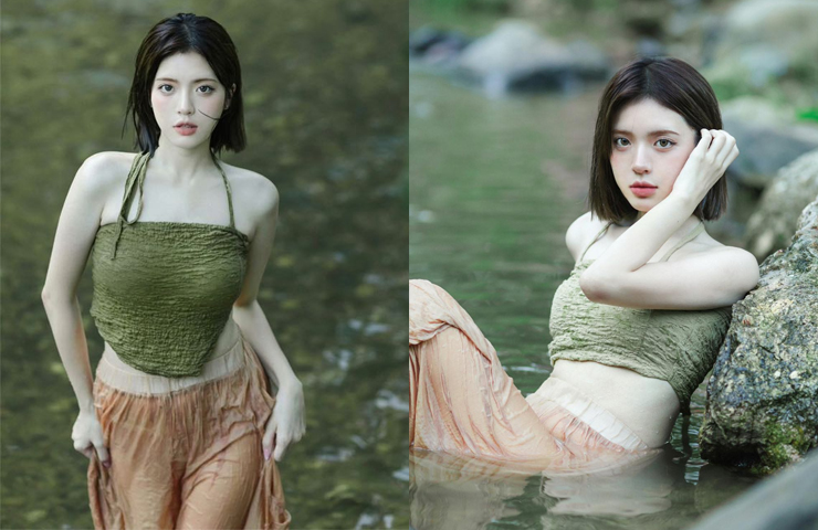 Một mỹ nữ Trung Quốc 19 tuổi được khen hết lời khi mặc áo yếm chụp hình bên suối.

