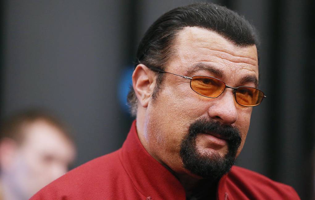 Diễn viên phim hành động người Mỹ Steven Seagal được ông Putin vinh danh. Ảnh: TASS