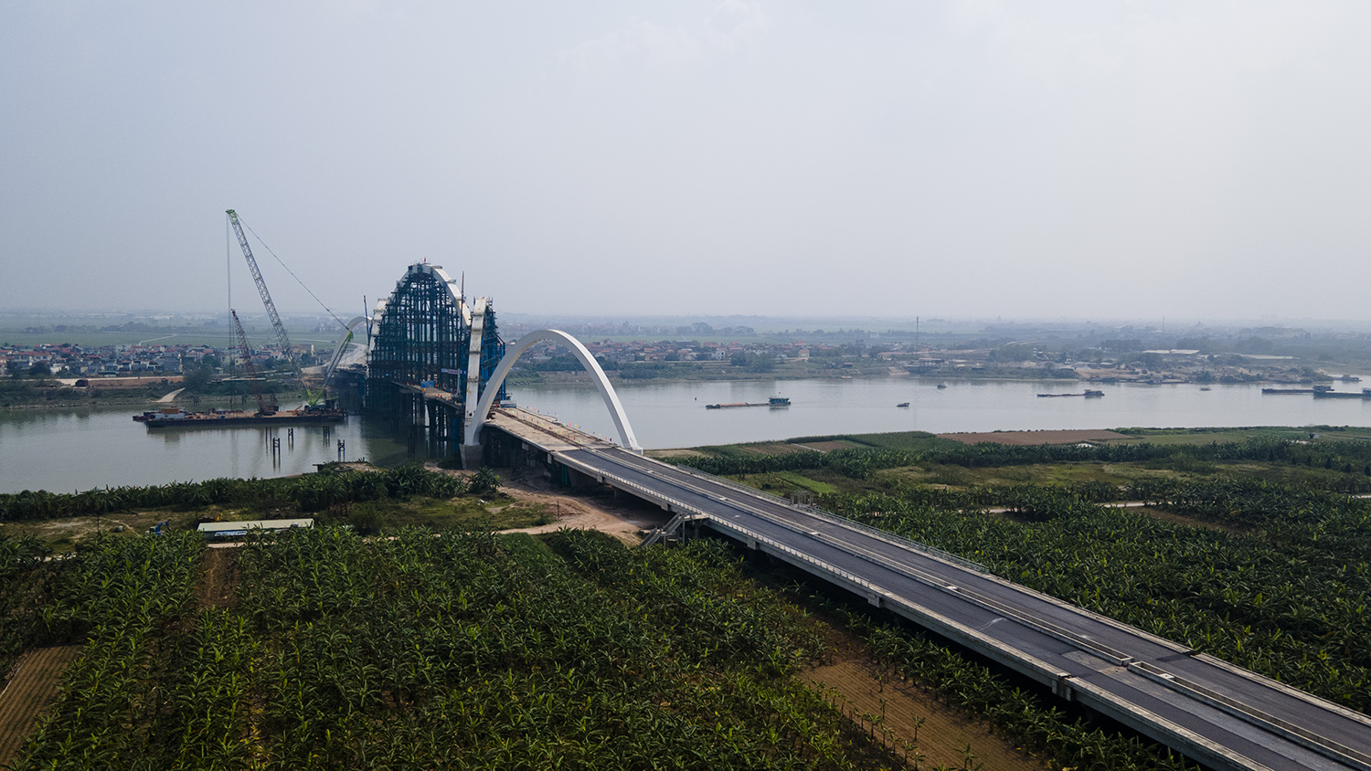 Cầu vòm thép cao nhất Việt Nam hình 2 con rồng uốn lượn đã thành hình - 15