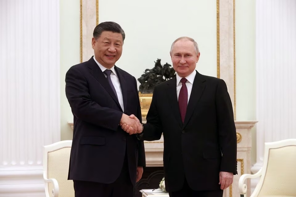 Ông Putin và ông Tập gặp nhau tại Điện Kremlin (ảnh: TASS)