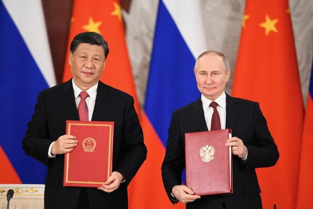 Tổng thống Nga Vladimir Putin và Chủ tịch Trung Quốc Tập Cận Bình tại lễ ký kết các thỏa thuận hợp tác trong Điện Kremlin ngày 21/3. (Ảnh: Sputnik)