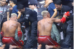 Võ sĩ Trần Quang Lộc quỳ gối, trao đai vô địch MMA cho Johnny Trí Nguyễn