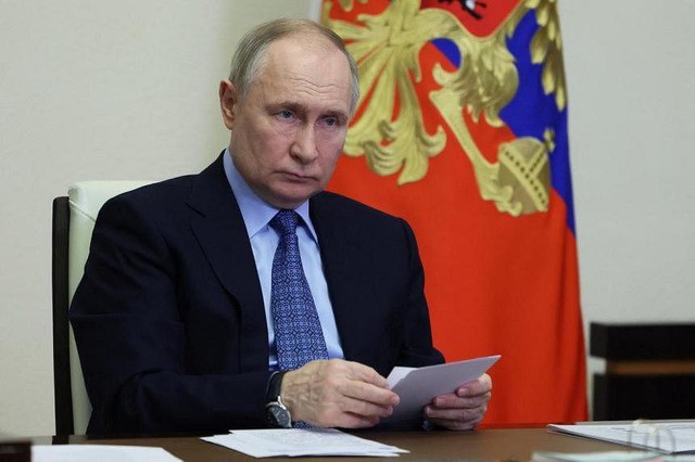 Tổng thống Nga Vladimir Putin vừa ký sắc lệnh kêu gọi 150.000 công dân đi nghĩa vụ quân sự theo luật định. Ảnh: Reuters