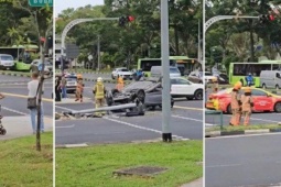 Ô tô lật ngược, húc đổ đèn giao thông, tài xế có phản ứng "lạ"