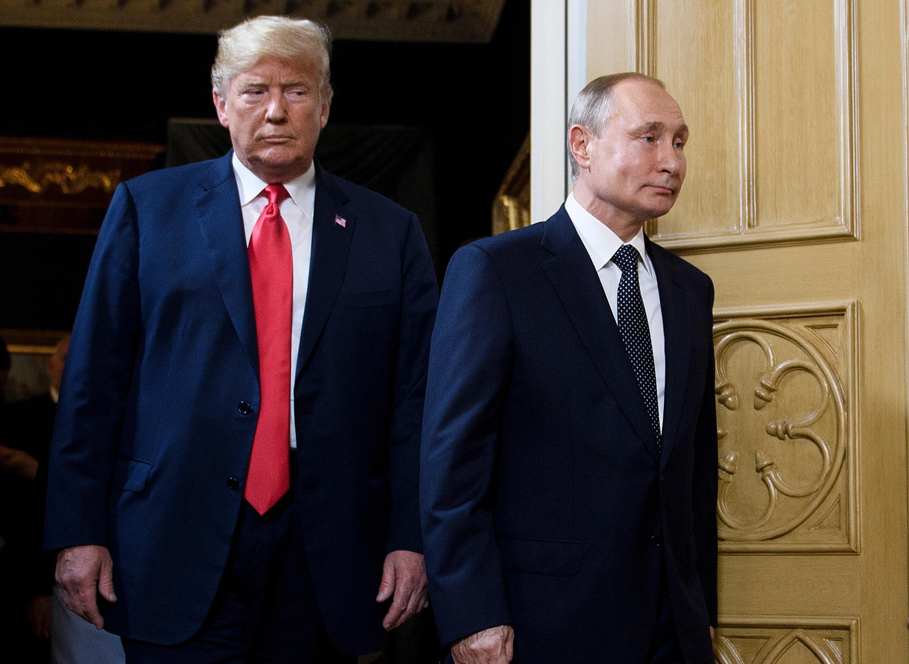 Tổng thống Mỹ Donald Trump (trái) gần đây nói ông tin người đồng cấp Nga Vladimir Putin thực sự muốn chấm dứt xung đột ở Ukraine. Ảnh: AFP.