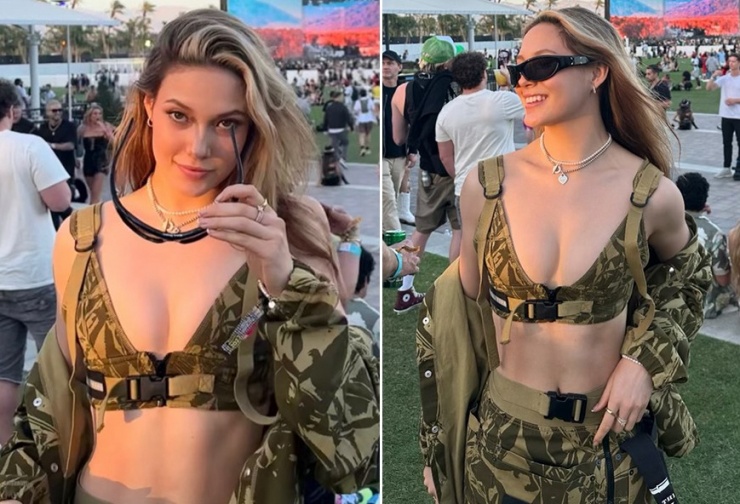 Cốc Ái Lăng mặc phóng khoáng khi đi xem show nhạc.