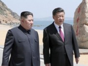 Thế giới - Vì sao Kim Jong-un đột nhiên sang Trung Quốc gặp ông Tập bên bờ biển?