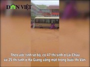 Giáo dục - du học - Clip: Thí sinh vượt nước lũ đi thi bằng xe đặc chủng, ăn mỳ qua bữa