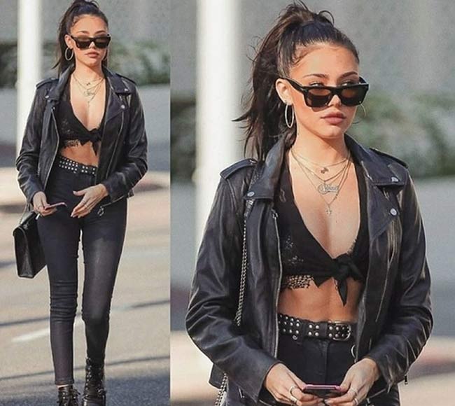 Cô có nhiều cách phối trang phục với crop top. Chẳng hạn như set áo chẽn ngắn kết hợp quần jean, áo khoác da biker.