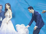 Đời sống Showbiz - Xóa tan tin đồn ly hôn bằng việc xuất hiện bên Angelababy, Huỳnh Hiểu Minh còn cúi rạp người nâng váy cho bà xã