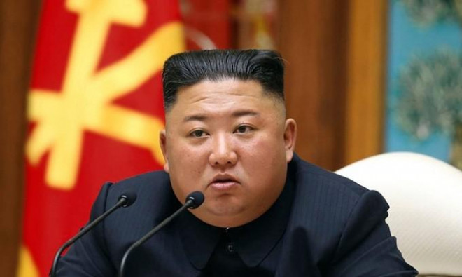Nhà lãnh đạo Kim Jong-un chủ trì cuộc họp Bộ Chính trị của đảng Lao động Triều Tiên ngày 11-4. Ảnh: KCNA
