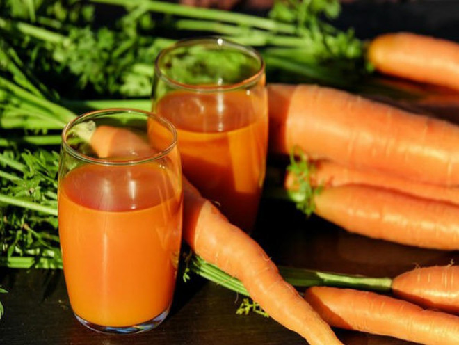 Nước ép cà rốt có thể tăng cường sức khỏe của chúng ta. Ảnh: Internet