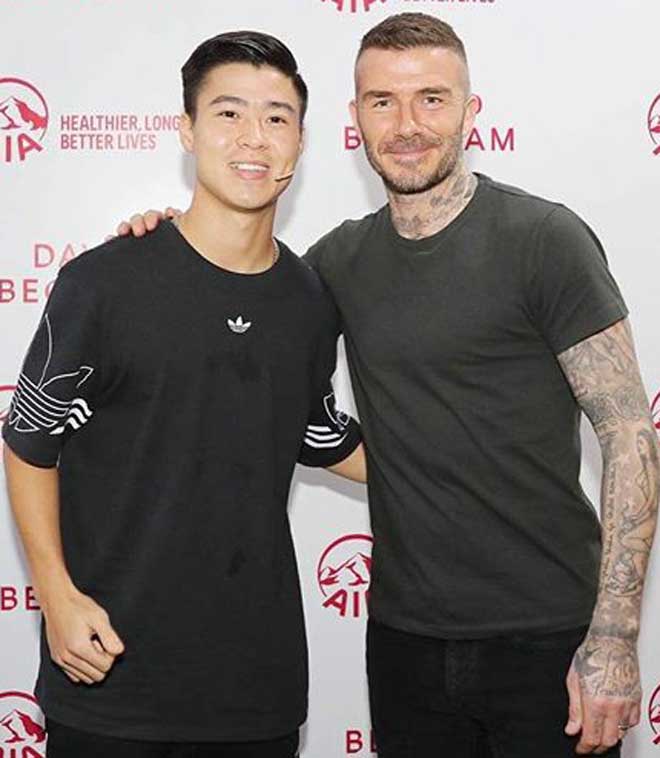 Duy Mạnh chụp cùng Beckham ở một sự kiện vào tháng 3/2019