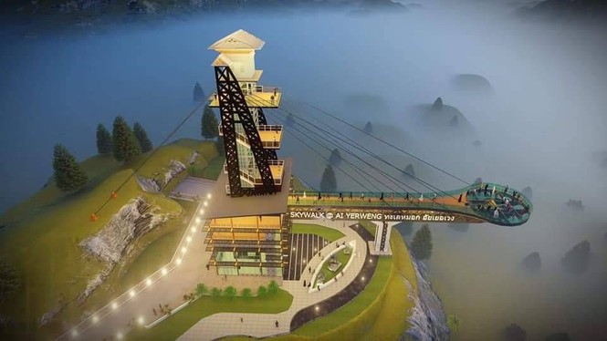 Với tầm nhìn từ trên cao, &nbsp;Ai Yerweng Skywalk&nbsp;lung linh với những ánh đèn và chìm giữa "biển sương mù" mờ ảo