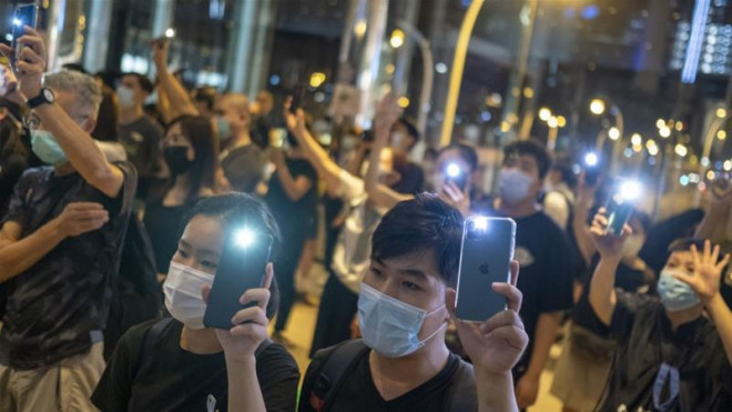 Người biểu tình Hong Kong biểu tình phản đối dự luật an ninh quốc gia. Ảnh: Justin Chin/BLOOMBERG