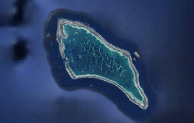 Ảnh vệ tinh đảo Canton thuộc quần đảo Kiribati ở Thái Bình Dương. Căn cứ không quân nằm ở góc trên cùng /Google Earth.
