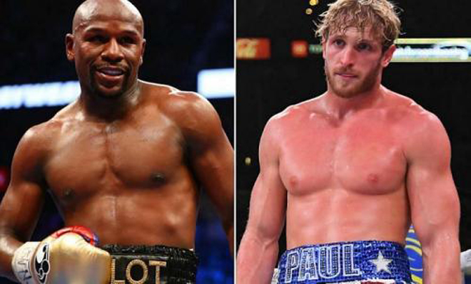 Mayweather (trái) thua Logan về chiều cao&nbsp;tới 15cm