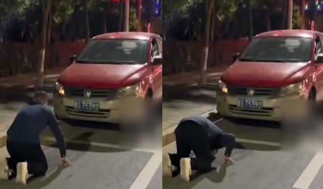 Người đàn ông bất ngờ dừng xe rồi quỳ lạy trước ô tô, nguyên nhân khiến ai nấy đều bất ngờ - 1
