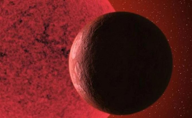 Ảnh đồ họa mô tả siêu Trái Đất màu đỏ thẫm vừa được phát hiện - Ảnh: SMM/IAC