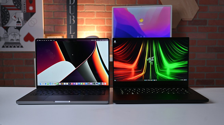 MacBook Pro 14 inch 2021 và&nbsp;Razer Blade 14 2022.