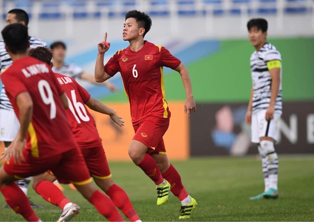 "In4"  by Vu Tien Long - the player who scored "golden goal"  in the match U23 Vietnam drew U23 Korea - 1
