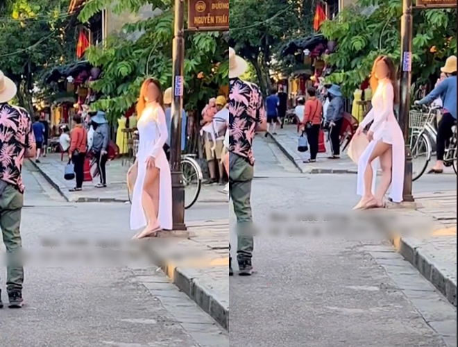 Another case of foreign tourists wearing offensive ao dai in the middle of the street - 1