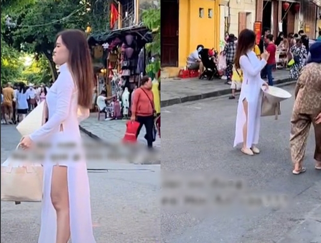 Another case of foreign tourists wearing offensive ao dai in the middle of the street - 3