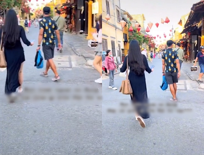 Another case of foreign tourists wearing offensive ao dai in the middle of the street - 4