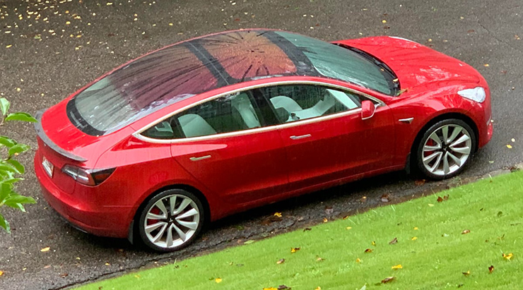 Độc đáo chức năng tự lên kính khi trời mưa của xe Tesla - 3